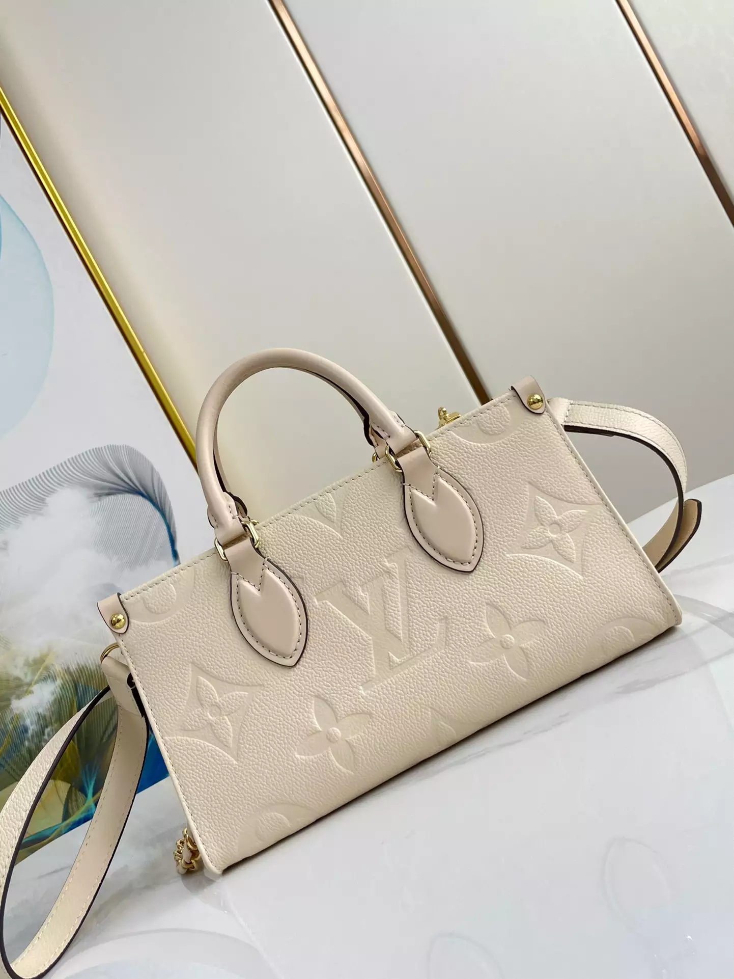 OnTheGo East West Monogram Empreinte Creme Leather - Repbags.ru - Image 4