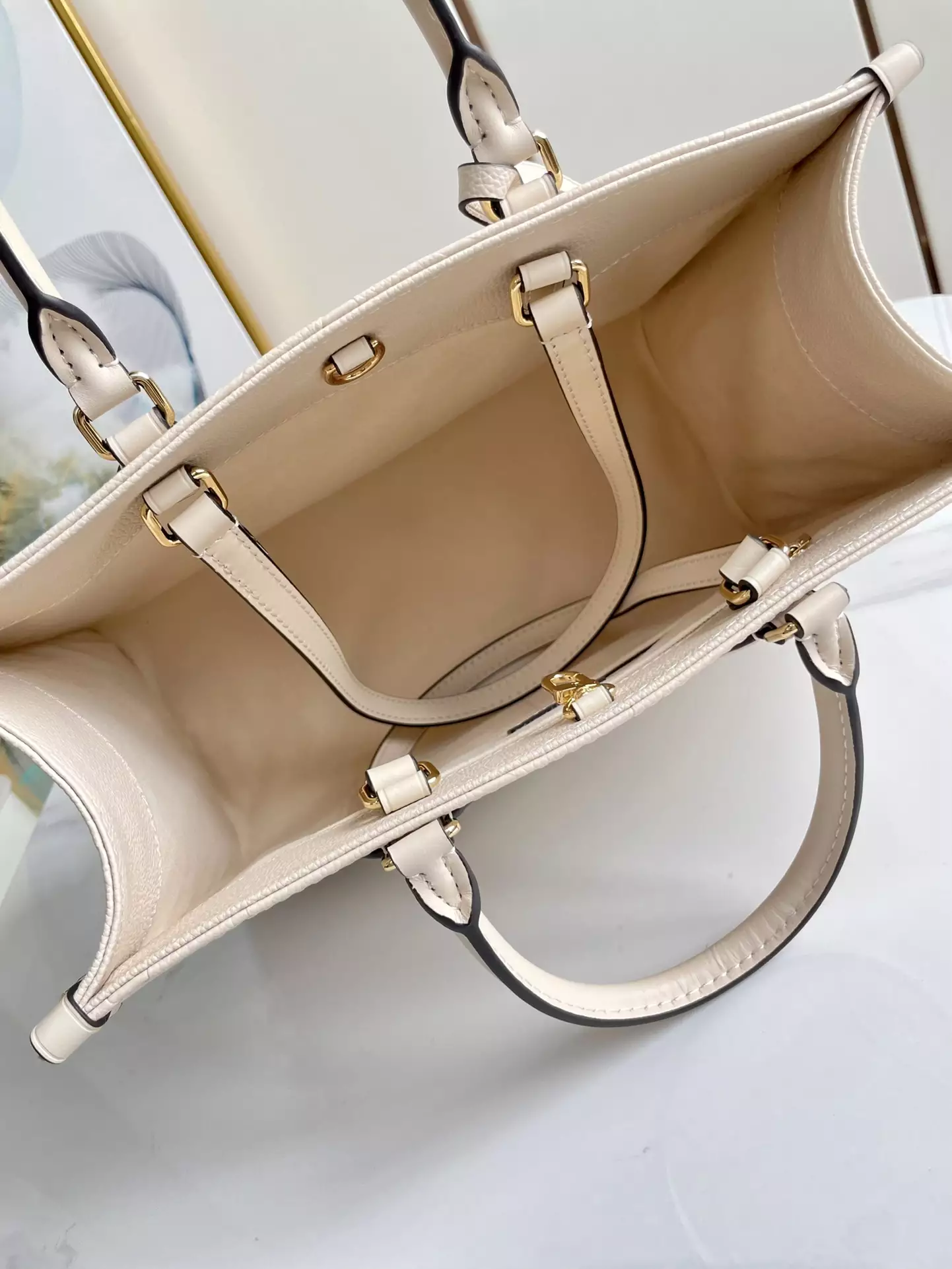 OnTheGo MM Monogram Empreinte Cream Leather - Repbags.ru - Image 9