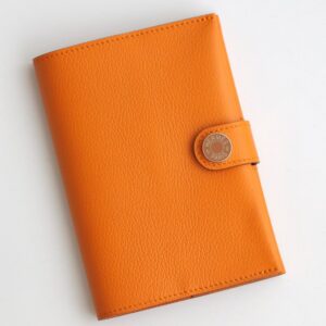 Hermes R.M.S Passport Holder in Apricot Evercolor Calfskin